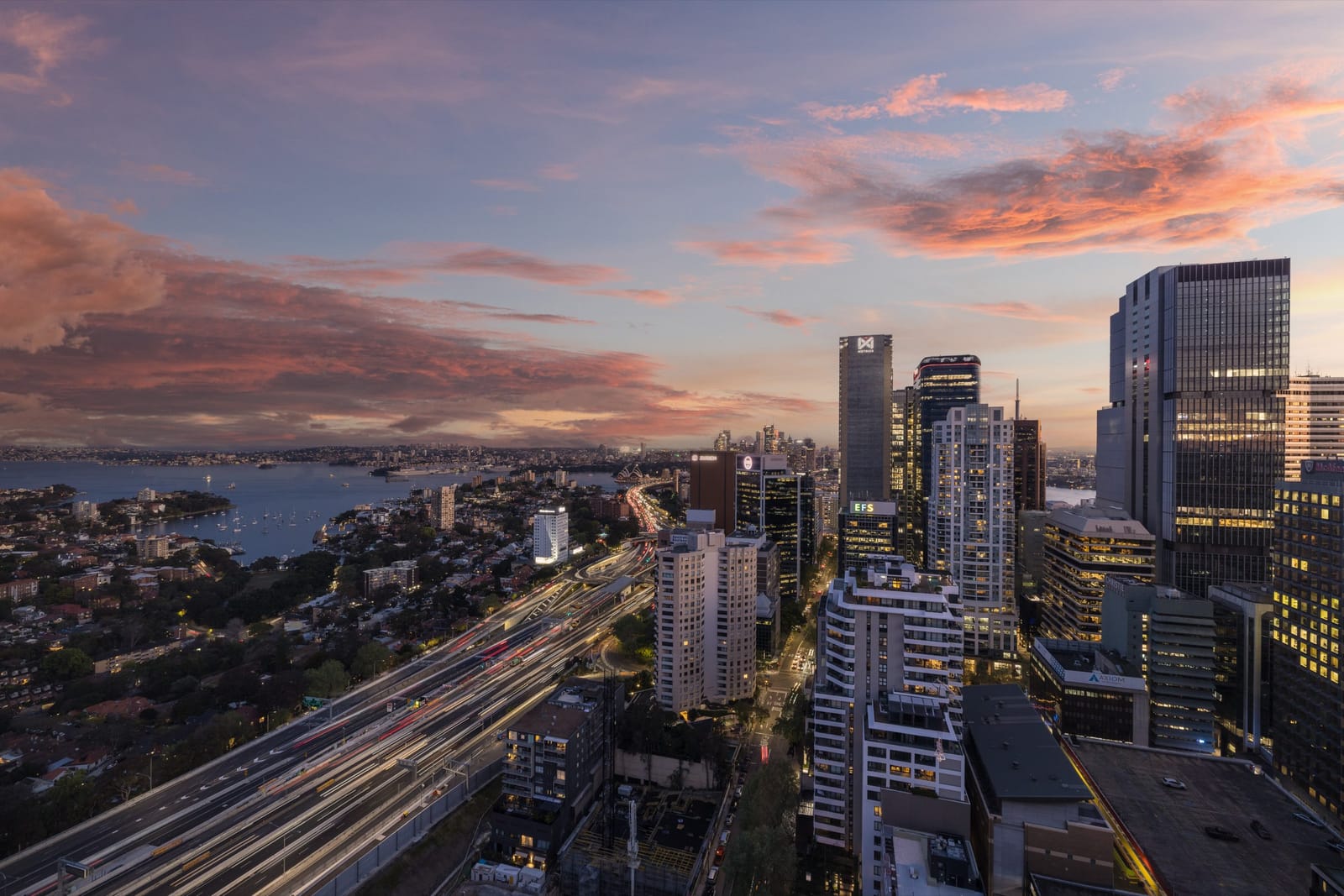 The Sydney skyline and harbour at dusk